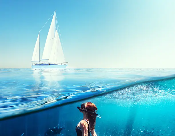 Looking at her, I could see white sails and blue water.