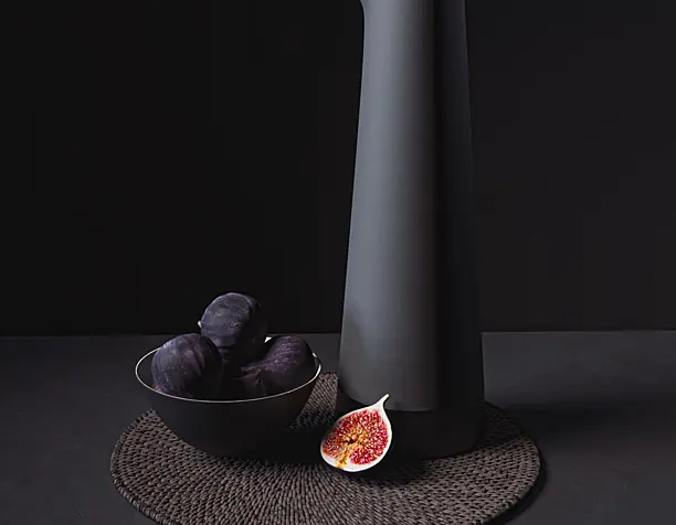 Black Tableware and Figs on Placemat