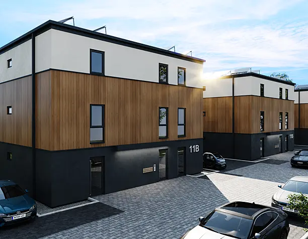 A three-story communal residential building designed for 9 households