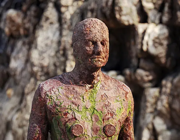 Anthony Gormley sculpture on the beach.