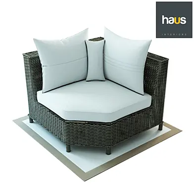 Haus Interior, Corner armchair made of woven rattan