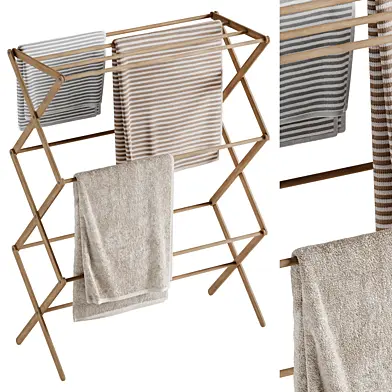 Wooden towel rack with hanging towels