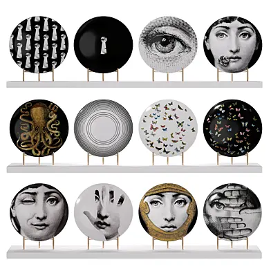 Набор декоративных тарелок бренда Fornasetti