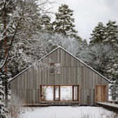 Winter house in the forest