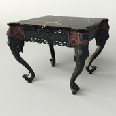 Table with elephants