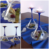 decorative set with glasses and candlelight