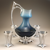 Art nouveau pitcher with cups