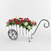 flowers in a wheelbarrow