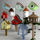 Set of wooden birdhouses and feeders