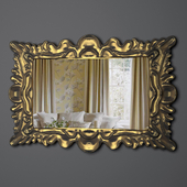 Mirror in a gold frame