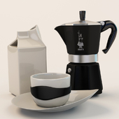 Geyser coffee, milk jug and a cup