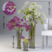 Three floral compositions of different heights