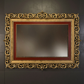The mirror in carved frame