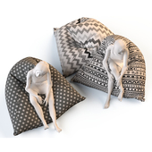 Triangular chair cushions with mannequins