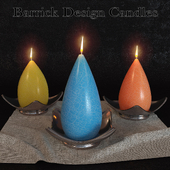 A set of decorative candles from the company Barrick Design Candles