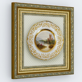 Decorative plate in a wooden frame