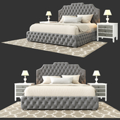 Grey tufted bed