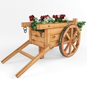 A cart under the flowers.