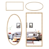 A set of mirrors in a classic frame made of wood.