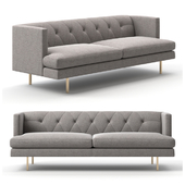 CB2 - Avec grey sofa with brass legs