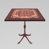 Square table with single leg pattern