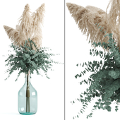 Cortaderia and eucalyptus in a large bottle