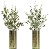 Olive stems in simple glass ribbed vase