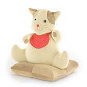 Interior toy cat on a pillow