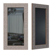Mirror in a frame with ethnic ornament