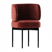 Upholstered chair with armrests