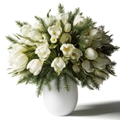 Bouquet of white tulips in a white vase