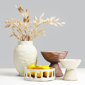 Decorative set of vases with lemons.