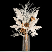 Bouquet of dried flowers in a glass vase with dry white branches of pampas, Dry lotus, Solidago . 156.