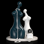 Womens sculptures, beads and perfume on a tray. Decorative set Artlandtis Modern Body Class