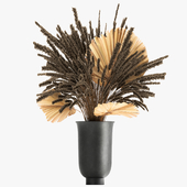 A magnificent bouquet of dried flowers in a black vase with veinik, branches of dry palm leaves. 166.