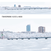 Winter panorama. View of the lake and bridge.