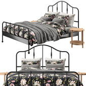 IKEA SAGSTUA SAGSTUA bed with black frame and two tables LISTERBY