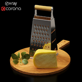 ROUND CUTTING BOARD WITH FOUR SIDED GRATER