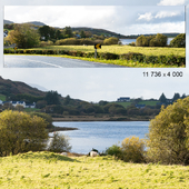 Autumn panorama. Northern Ireland. View of the bay, mountains, field and private sector.