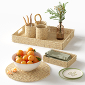 A set of kitchen holders made of wooden beads with tangerines and a bouquet of asparagus and tansy