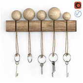 wall-mounted keyholder with wooden key rack