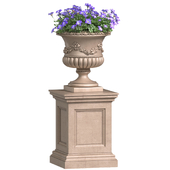 Flower Petunia purple in a classic vase for decorating the facade.Petunia Plant Flowerpot