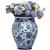 Bouquet of flowers in an Italian vase with hand-painted Santorini