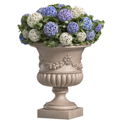 Hydrangea in a classic vase for decoration facade.Flowers Garden Plant Flowerpot Patio