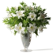 Bouquet of lilies in a classic glass vase
