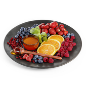 Plate with berries and fruits