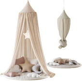 Canopy for the nursery with pillows and decor