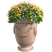 Classic Vase pot pot with yellow flowers for decoration.Flower bed