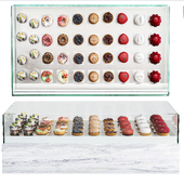 Display case with desserts. Pastry, cake