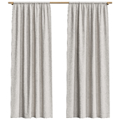 Linen curtains on a wooden cornice